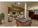 Finished basement with a bar area, game table, and comfortable seating at 98 Glenmoor Ln, Cherry Hills Village, CO 80113