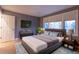 Spacious bedroom with hardwood floors and large windows at 98 Glenmoor Ln, Cherry Hills Village, CO 80113