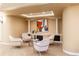 Sitting area with modern decor featuring matching chairs, accent lighting, and artwork at 98 Glenmoor Ln, Cherry Hills Village, CO 80113