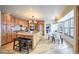 Spacious kitchen featuring a large island, stainless appliances, and breakfast nook at 7311 Brixham Cir, Castle Pines, CO 80108