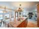 Beautiful kitchen island connects to the breakfast nook and the living room at 7311 Brixham Cir, Castle Pines, CO 80108