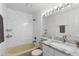 Updated bathroom with granite countertop and bathtub at 8600 E Alameda Ave # 22-207, Denver, CO 80247