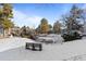 Community view with pond, snow covered grounds and trees at 8600 E Alameda Ave # 22-207, Denver, CO 80247