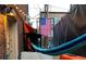 Enclosed backyard with string lights, fence and pavers at 1421 N Pearl St # 2, Denver, CO 80203