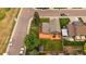 Aerial view of home highlighting backyard with orange deck and well-maintained lawn at 10859 W Fair Ave, Littleton, CO 80127