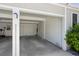 Open and empty attached garage with concrete floors at 7970 Chase Cir # 85, Arvada, CO 80003