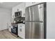Well-equipped kitchen features stainless steel appliances, modern cabinetry, and efficient layout at 7970 Chase Cir # 85, Arvada, CO 80003