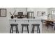 Updated kitchen boasts stainless appliances, a breakfast bar, and modern finishes for a stylish cooking space at 7970 Chase Cir # 85, Arvada, CO 80003