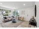 Inviting living room boasts a large window and neutral decor, perfect for relaxation and entertaining guests at 7970 Chase Cir # 85, Arvada, CO 80003