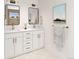 Contemporary bathroom featuring double sinks, modern fixtures, and ample counter space at 2281 S Sherman St, Denver, CO 80210