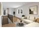 Cozy living area with hardwood floors, stylish seating, and an inviting atmosphere at 2281 S Sherman St, Denver, CO 80210
