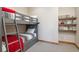 Cozy bedroom with built-in bunk beds and a lovely bookshelf at 41 Barton Ridge Dr, Breckenridge, CO 80424