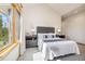 Bright bedroom with large window featuring forest view at 41 Barton Ridge Dr, Breckenridge, CO 80424