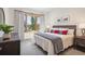 Comfortable bedroom featuring a large window with stunning views and stylish decor at 41 Barton Ridge Dr, Breckenridge, CO 80424