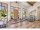 Grand entryway with hardwood floors, large windows, and mountain views at 41 Barton Ridge Dr, Breckenridge, CO 80424