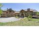Inviting exterior with wooden accents, stone details, and a well-manicured lawn at 41 Barton Ridge Dr, Breckenridge, CO 80424