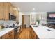Bright kitchen with stainless steel appliances, lots of cabinetry and quartz countertops at 41 Barton Ridge Dr, Breckenridge, CO 80424