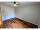 Hardwood-floored bedroom featuring a ceiling fan and ample closet space at 17361 E Mansfield Ave # 532R, Aurora, CO 80013