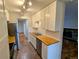 Galley kitchen featuring light wood countertops and stainless steel appliances at 17361 E Mansfield Ave # 532R, Aurora, CO 80013