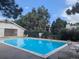 Community pool features lounge chairs and pristine clear blue water at 17361 E Mansfield Ave # 532R, Aurora, CO 80013