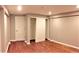 Bedroom features hardwood floors, a closet, and natural light from a window at 1555 California St # 302, Denver, CO 80202