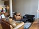 Spacious living area with wood floors and a combined living room and kitchen space at 1555 California St # 302, Denver, CO 80202