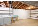 Spacious unfinished basement with washer and dryer hookups, and a clean and open floor plan at 8100 W 8Th Ave, Lakewood, CO 80214