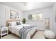 Bedroom features natural light and updated decor at 8100 W 8Th Ave, Lakewood, CO 80214