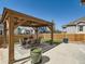 Outdoor patio with pergola and seating at 12734 E 104Th Pl, Commerce City, CO 80022