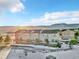 Townhome exterior featuring multiple decks and mountain views at 909 Burning Bush Pt, Monument, CO 80132