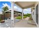 Backyard patio with a gazebo, landscaped yard, and a walking path at 15525 Quince Cir, Thornton, CO 80602