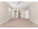 Bedroom with neutral carpet flooring, closet and bathroom access at 15525 Quince Cir, Thornton, CO 80602