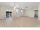 Open dining room with sliding glass doors leading to the backyard and an outdoor living space at 15525 Quince Cir, Thornton, CO 80602