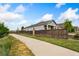 Lovely single-story home featuring a well-maintained yard and wood fence offering privacy at 15525 Quince Cir, Thornton, CO 80602