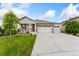Charming single-Gathering home with a well-manicured lawn and inviting stone accents at 15525 Quince Cir, Thornton, CO 80602