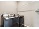Laundry room featuring modern washer and dryer at 15525 Quince Cir, Thornton, CO 80602
