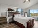 This bedroom offers ample natural light and views of the surrounding landscape at 6055 W Progress Ave, Littleton, CO 80123
