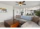Comfortable living room with stylish decor and staircase view at 6055 W Progress Ave, Littleton, CO 80123
