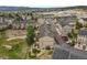 Aerial view of townhouses and surrounding landscape at 985 Burning Bush Pt, Monument, CO 80132