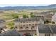 Aerial view of a three-story townhouse at 985 Burning Bush Pt, Monument, CO 80132