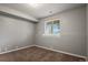 Finished basement room with carpet and window at 985 Burning Bush Pt, Monument, CO 80132