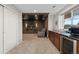 Basement with a home theater area and kitchenette at 26741 E Arbor Dr, Aurora, CO 80016