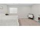 Bedroom features neutral paint, carpet flooring, and great natural light at 26741 E Arbor Dr, Aurora, CO 80016