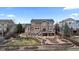 Stunning two-story home with a beautifully landscaped backyard, stone accents and large deck at 26741 E Arbor Dr, Aurora, CO 80016