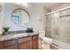 Updated bathroom with granite countertop, new toilet and sliding glass shower door at 15136 E Louisiana Dr # 106, Aurora, CO 80012