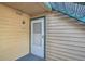 Close-up of the front door with the unit number and a secure entryway at 15136 E Louisiana Dr # 106, Aurora, CO 80012