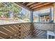 Private patio with wood fencing and serene views, perfect for relaxing outdoors at 15136 E Louisiana Dr # 106, Aurora, CO 80012