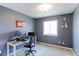 Home office with a computer, desk, and bright window for ample natural light at 11537 Macon St, Commerce City, CO 80640