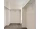 Walk-in closet with multiple shelves and rods for ample storage at 8867 Waterleaf Ln, Littleton, CO 80125