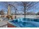 Hot tub on backyard patio with open space view at 6474 S Jericho Cir, Centennial, CO 80016